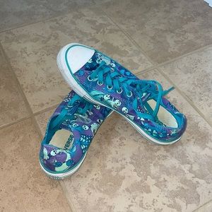Turquoise and purple Converse with skulls